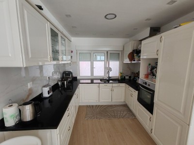Maison familiale 4 chambres, jardin et parking en centre ville