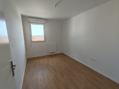 appartement T3 ( 2 chambres) neuf avec balcon et place de parking couverte