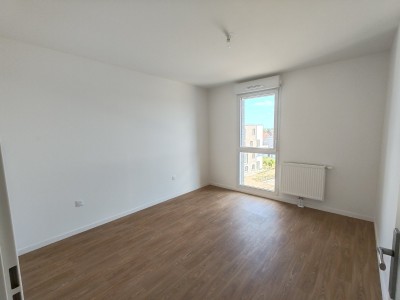 appartement T3 ( 2 chambres) neuf avec balcon et place de parking couverte