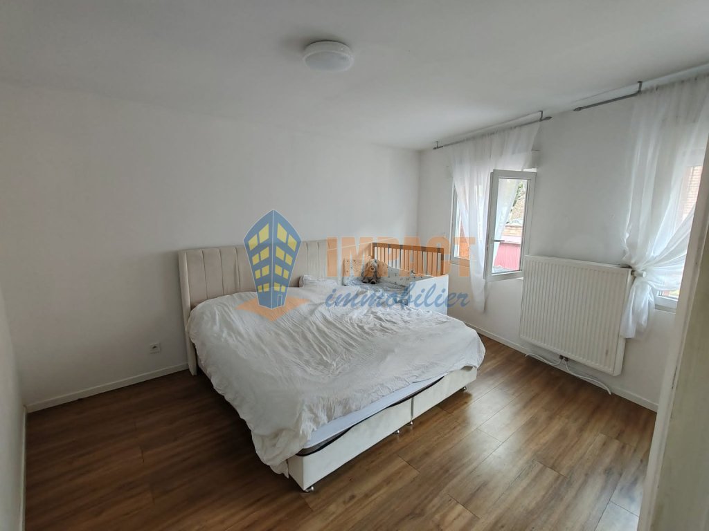 Maison familiale 4 chambres, jardin et parking en centre ville